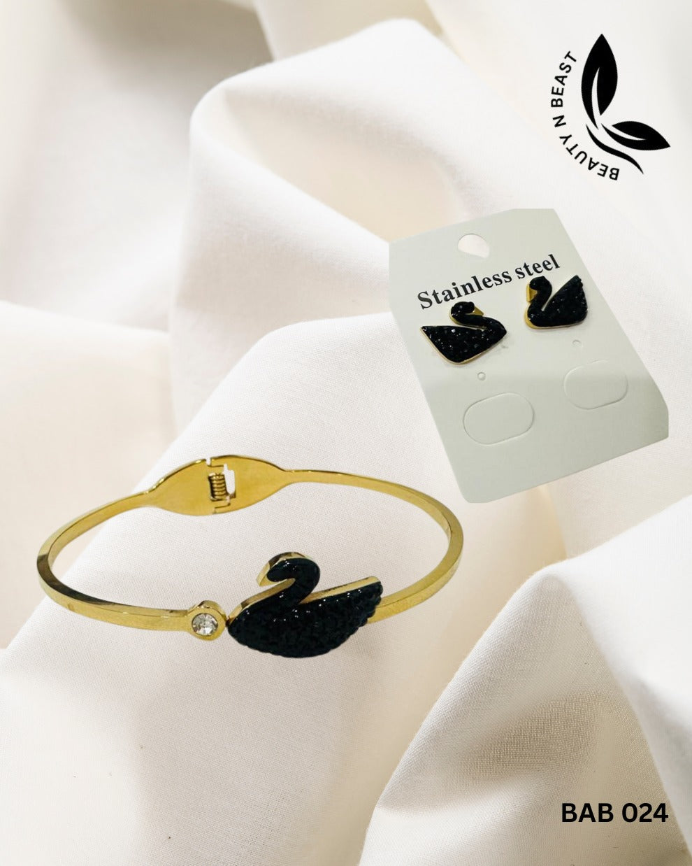 Stainless Steel Black Swan Set of pendant, handcuff and ear studs.